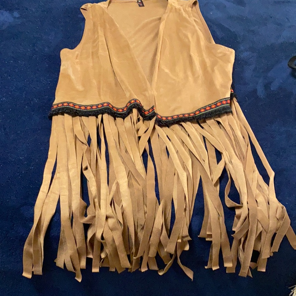 Ladies vest. Suede like fabric, long fringe trim.